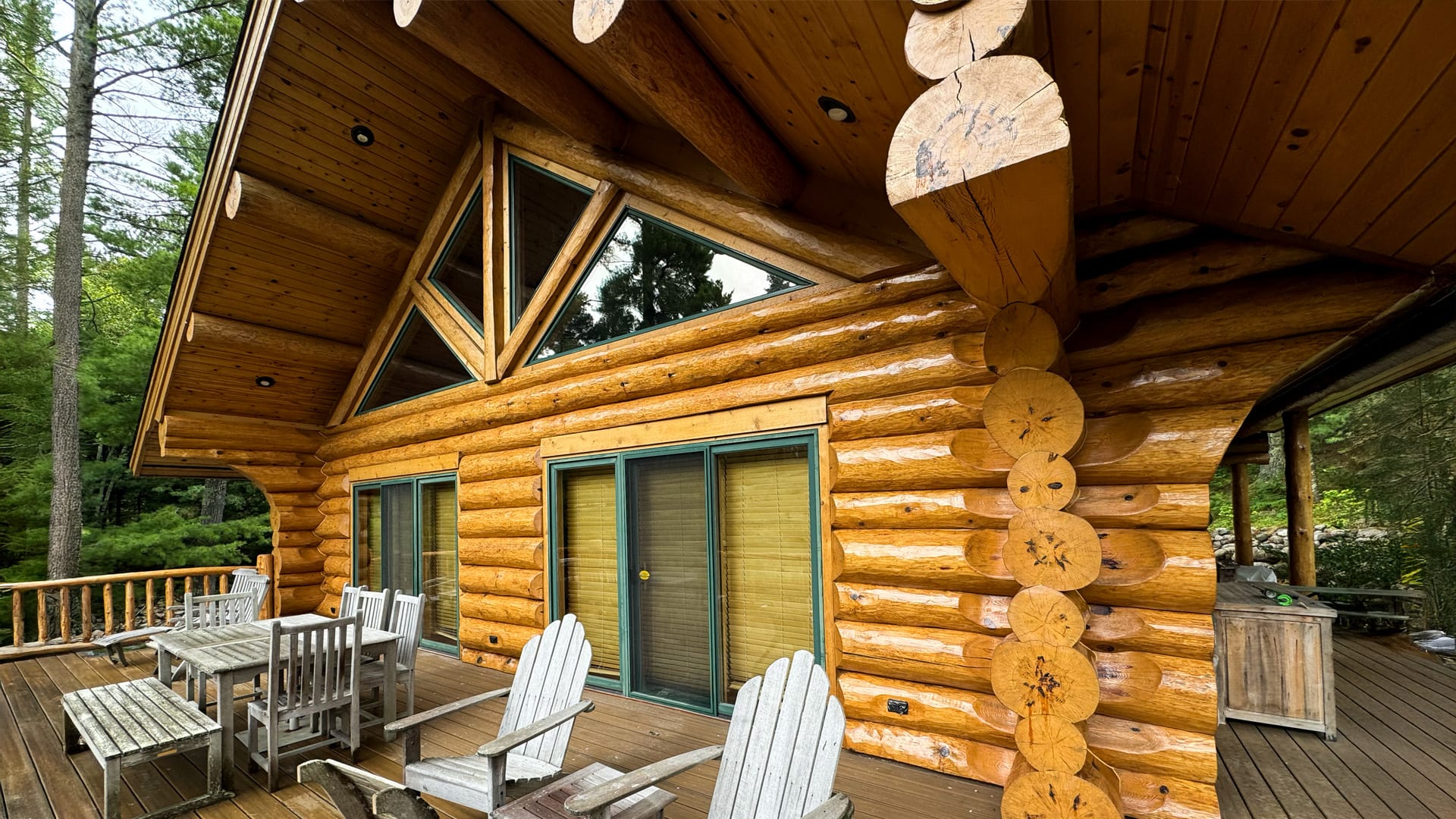 Restored log cabin with fresh chinking and stain